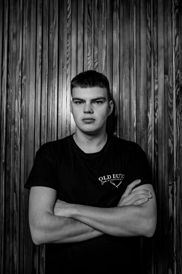 Senior barber Denis