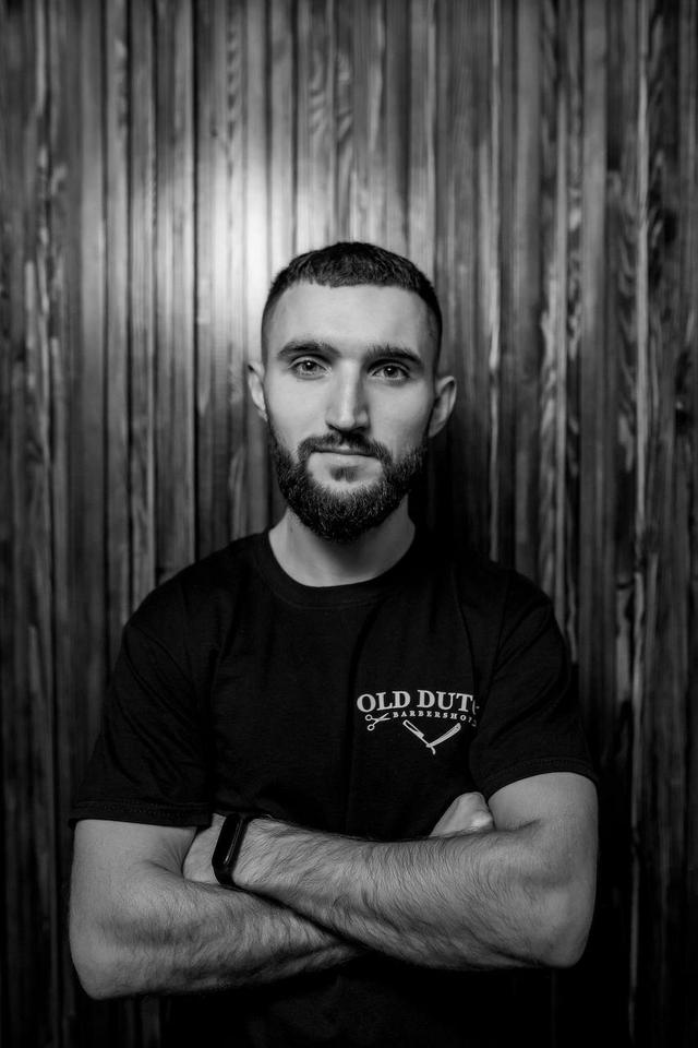 Senior barber Maksym